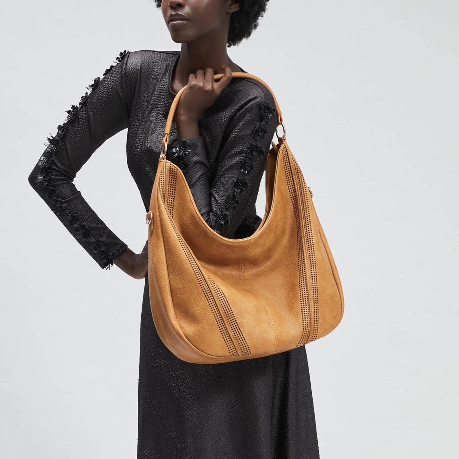 SAVANNAH Perforated Vegan Hobo Bag in Black | jeane+jax